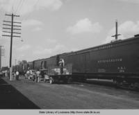 Loading strawberries into refrigerated railroad cars in Ponchatoula Louisiana in the 1930s