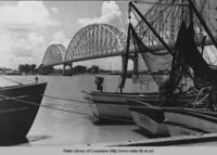 Shrimp boats and bridge over the Atchafalaya river in 1947