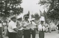 Young Tuxedo Brass Band members playing on memorial day