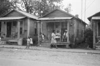 Family in front of Bogalusa Mill House 1