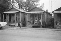 Family in front of Bogalusa Mill House 2