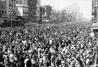 Crowds on Canal Street during Mardi Gras in 1936
