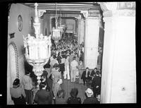 Crowd of People Gathered in a Lobby