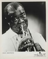 Louis Armstrong playing trumpet