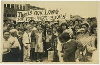 Huey P. Long at the Columbia Street dedication with banner, "Thanks GOV. LONG" FOR FREE TEXT BOOKS!