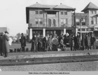 LSU Glee Club waiting for train at station in Ruston Louisiana in 1918