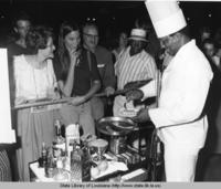 Chef preparing bananas foster at the Food Festival in New Orleans Louisiana in 1970