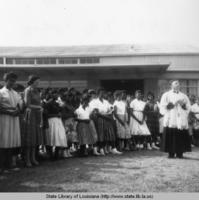 Blessing of the Ascension Parish bookmobile at Saint Catherine School in Donaldsonville Louisiana in 1960