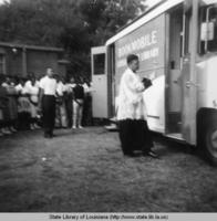 Blessing of the Ascension Parish bookmobile at Saint Catherine School in Donaldsonville Louisiana in 1960