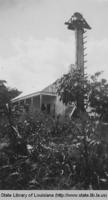 Bell on plantation house near Houma Louisiana in the 1930s