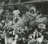 Rex Parade Float "Princess Kegatin" in front of Keller-Zander building, 814 Canal Street